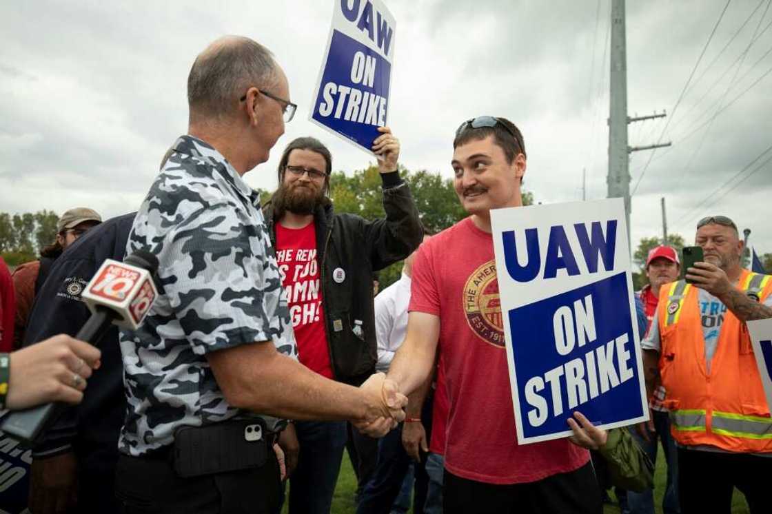 United Auto Workers President Shawn Fain greets UAW members as they strike the General Motors Lansing Delta Assembly Plant in September 2023 United Auto Workers President Shawn Fain greets UAW members as they strike the General Motors Lansing Delta Assembly Plant in September 2023
