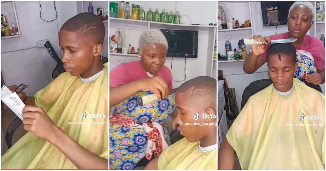 Female Nigerian barber, knife, nice haircut Female Nigerian barber, knife, nice haircut