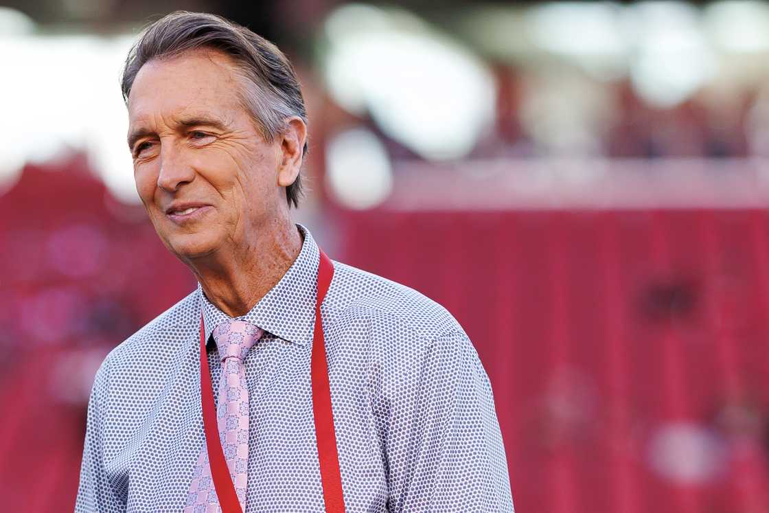 Cris Collinsworth stands on the field prior to an NFL football game between the Atlanta Falcons and the San Francisco 49ers at Levi's Stadium in Santa Clara