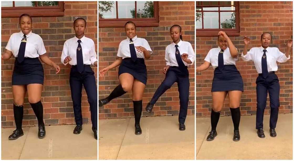 Photos of 2 female students in blue and white uniform dancing outside classroom. Photos of 2 female students in blue and white uniform dancing outside classroom.