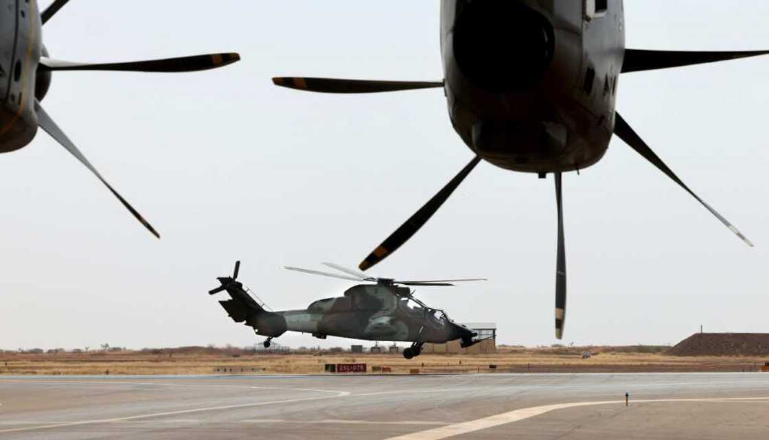 Airpower: A French military transport plane and combat helicopter at Gao in December 2021. France announced on Monday that it had vacated the base, its last in Mali Airpower: A French military transport plane and combat helicopter at Gao in December 2021. France announced on Monday that it had vacated the base, its last in Mali