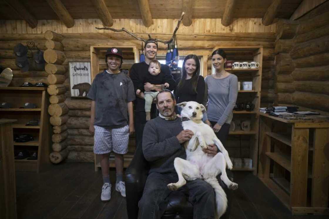 Churchill resident Danielle Daley (2nd-R), who is surrounded by her family, recently saw a polar bear run past her house in July, a time of year when residents have traditionally had fewer encounters Churchill resident Danielle Daley (2nd-R), who is surrounded by her family, recently saw a polar bear run past her house in July, a time of year when residents have traditionally had fewer encounters