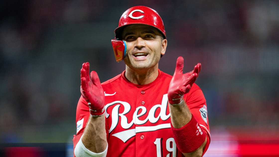 Joey Votto of the Cincinnati Reds claps during a game against the Toronto Blue Jays. Joey Votto of the Cincinnati Reds claps during a game against the Toronto Blue Jays.