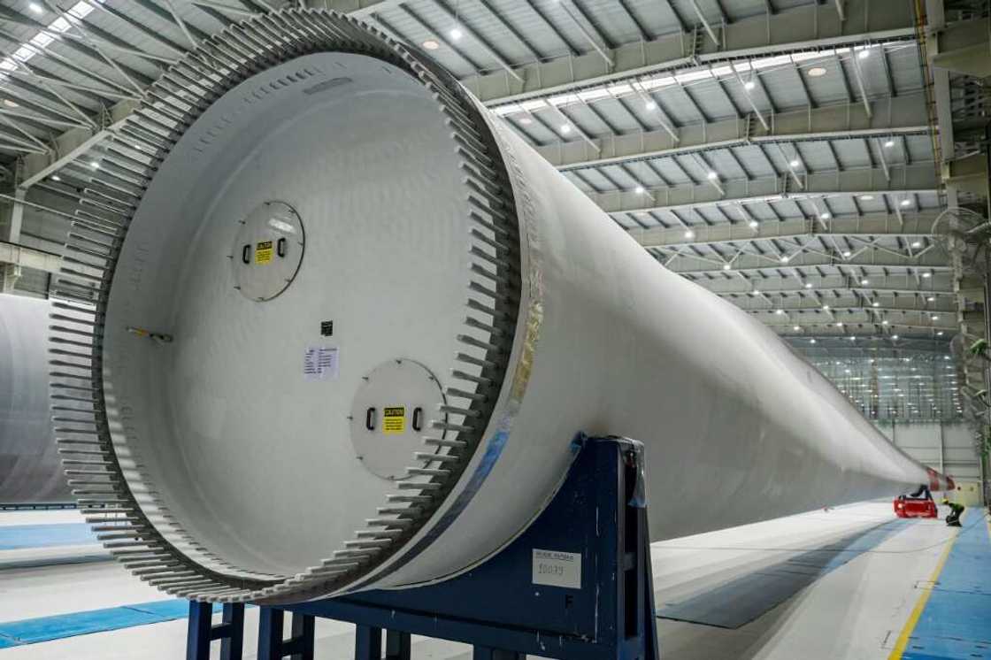 In Mundra, site of India's largest commercial port -- run by another arm of the Adani empire -- it is manufacturing key components for its aggressive solar and wind energy foray, including colossal wind turbine blades nearly 80 metres long In Mundra, site of India's largest commercial port -- run by another arm of the Adani empire -- it is manufacturing key components for its aggressive solar and wind energy foray, including colossal wind turbine blades nearly 80 metres long