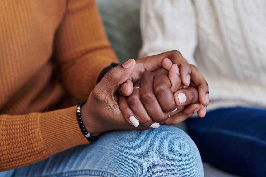 A couple holding hands A couple holding hands