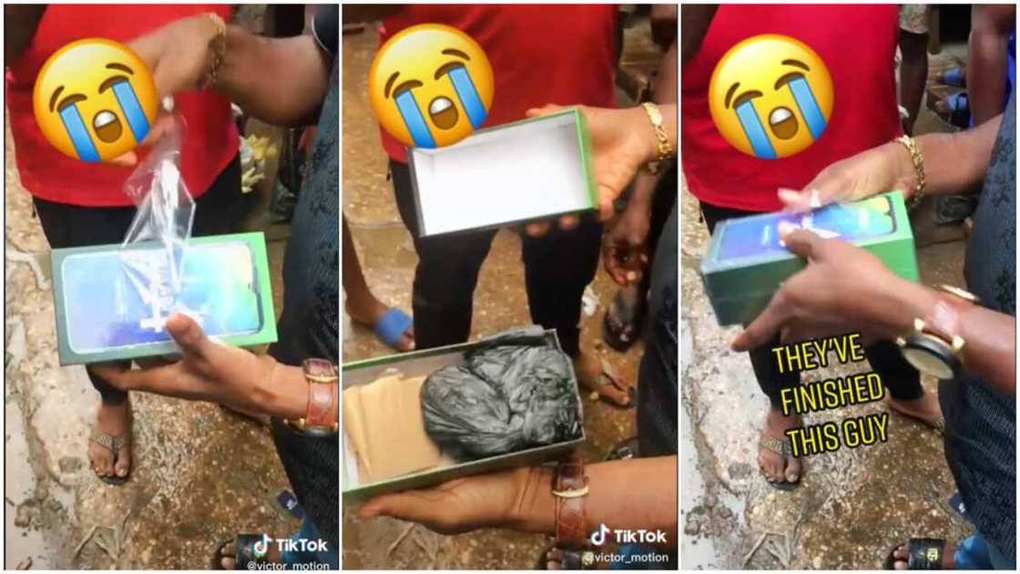 Fake Android phone box/man sees black nylon inside phone box. Fake Android phone box/man sees black nylon inside phone box.