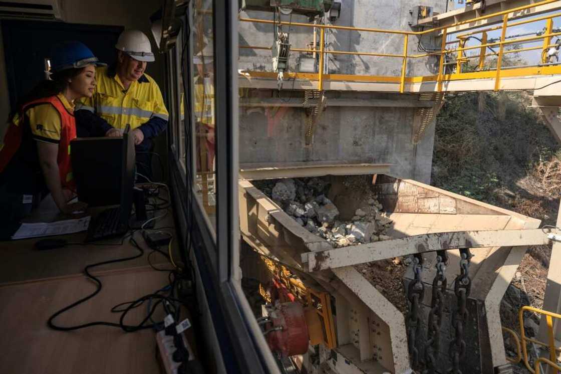 A controversial gold mine in northern Thailand reopens, pouring its first bars more than six years after it was closed over health and environmental concerns