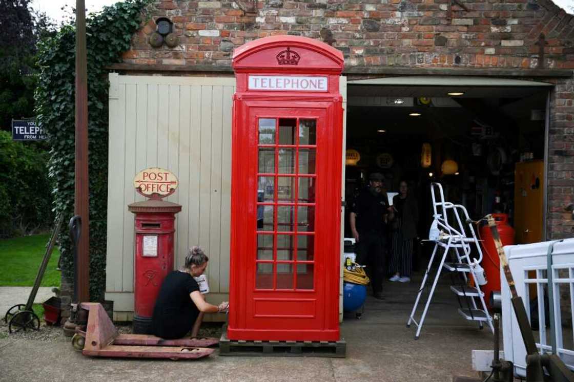 Redundant red phone boxes are increasingly being adopted by local communities and converted Redundant red phone boxes are increasingly being adopted by local communities and converted