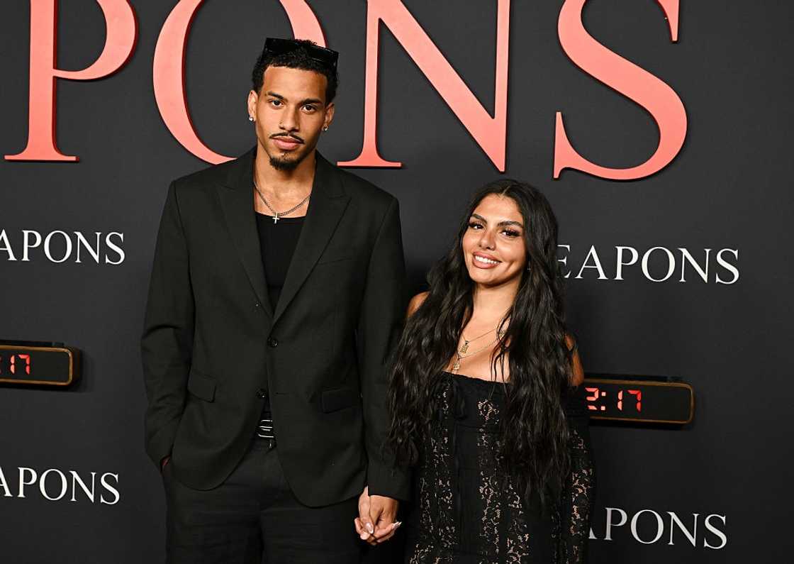 Louis Russell (L) and Huda Mustafa (R), posing for a photo Louis Russell (L) and Huda Mustafa (R), posing for a photo