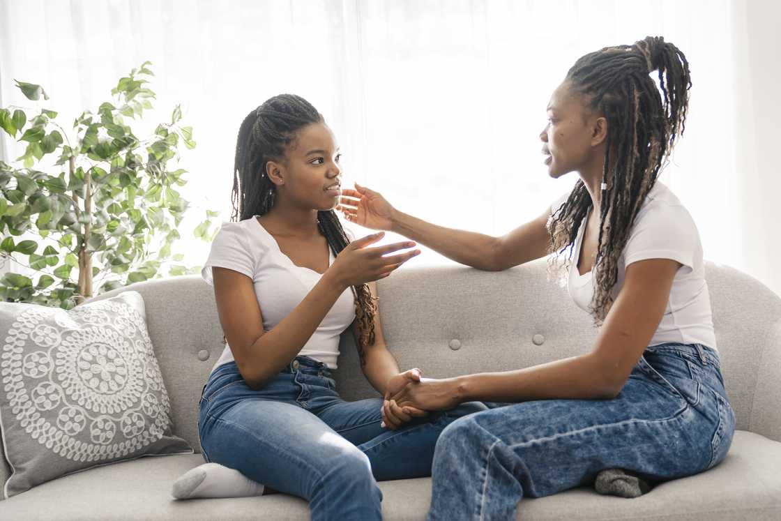 A mother talks to her daughter A mother talks to her daughter