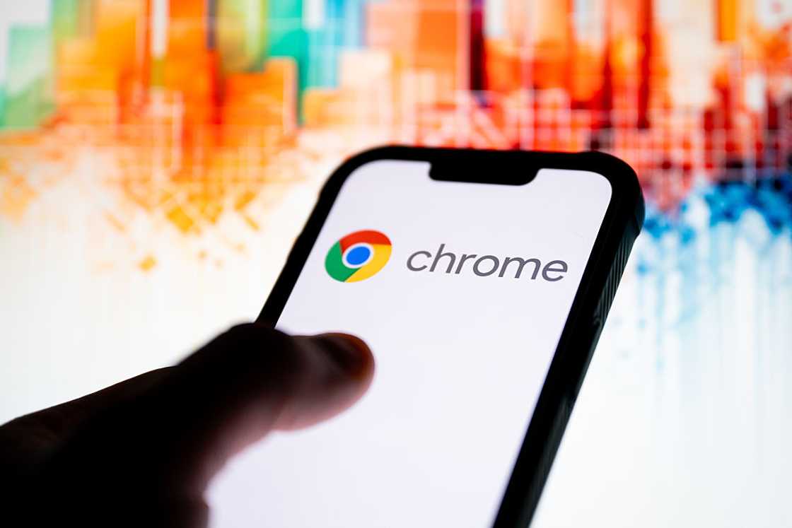 Google Chrome logo seen displayed on a smartphone Google Chrome logo seen displayed on a smartphone