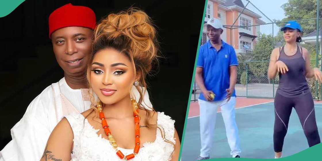 Regina Daniels and husband dance on long tennis court.