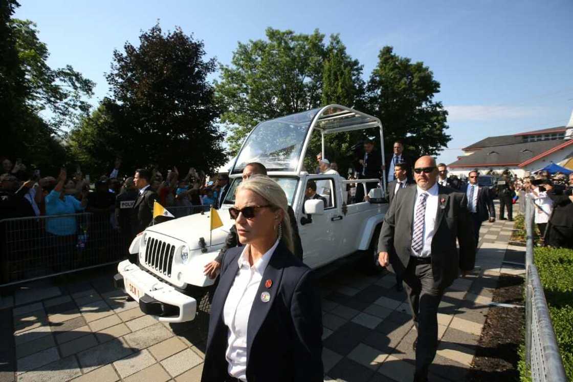 Pope Francis arrives at the shrine of Sainte-Anne-de-Beaupre in Quebec, Canada, and greets the crowd of thousands of people from his popemobile Pope Francis arrives at the shrine of Sainte-Anne-de-Beaupre in Quebec, Canada, and greets the crowd of thousands of people from his popemobile