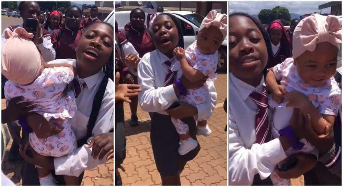 Photos of a student holding a fine baby. Photos of a student holding a fine baby.