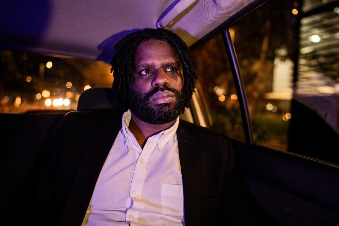 Angry man in an Uber backseat Angry man in an Uber backseat