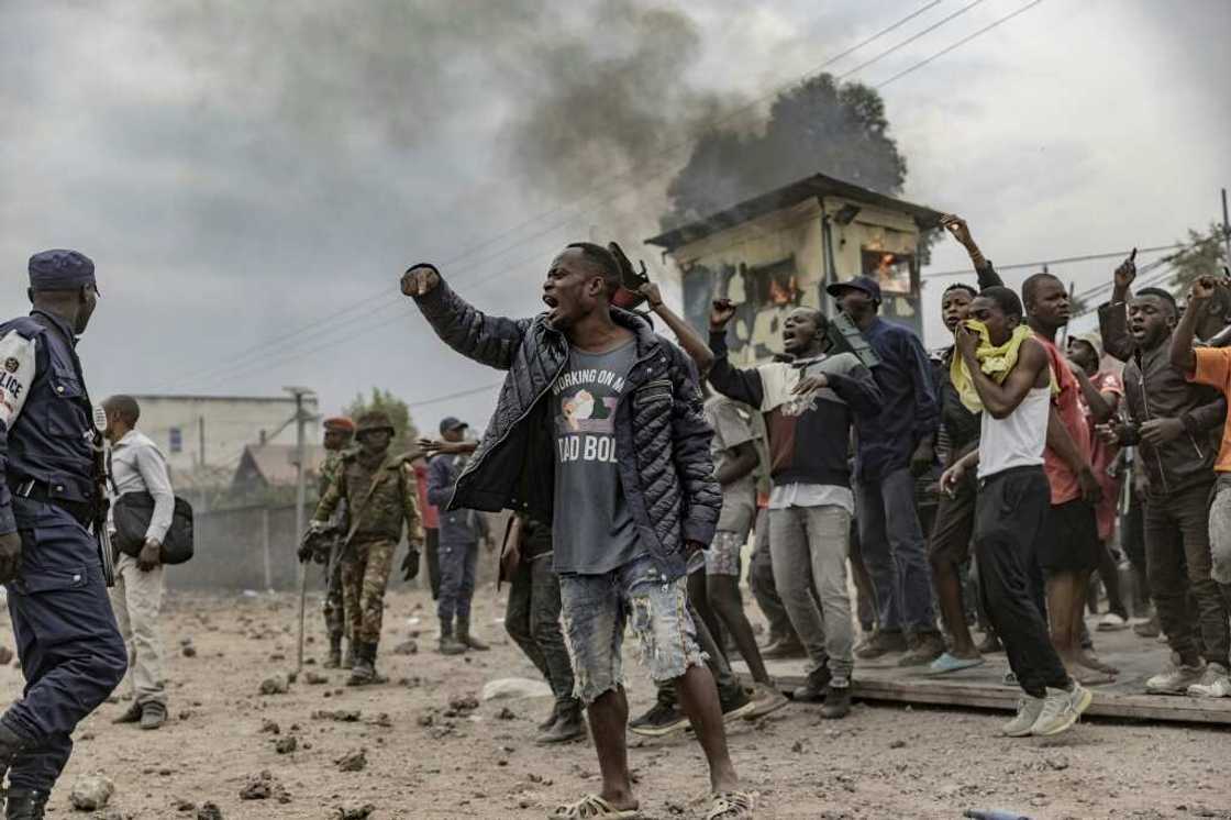 Many locals view UN peacekeepers as standing idly by while militias attack them Many locals view UN peacekeepers as standing idly by while militias attack them