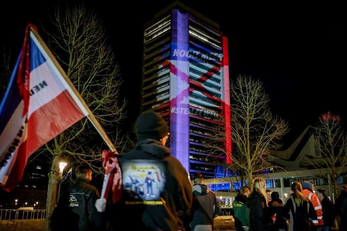 Dutch farmers protested outside a leaders' debate on the eve of the election