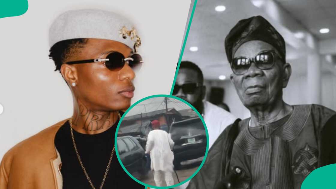 Wizkid reacts to video of his father walking in the rain amid Davido fight.