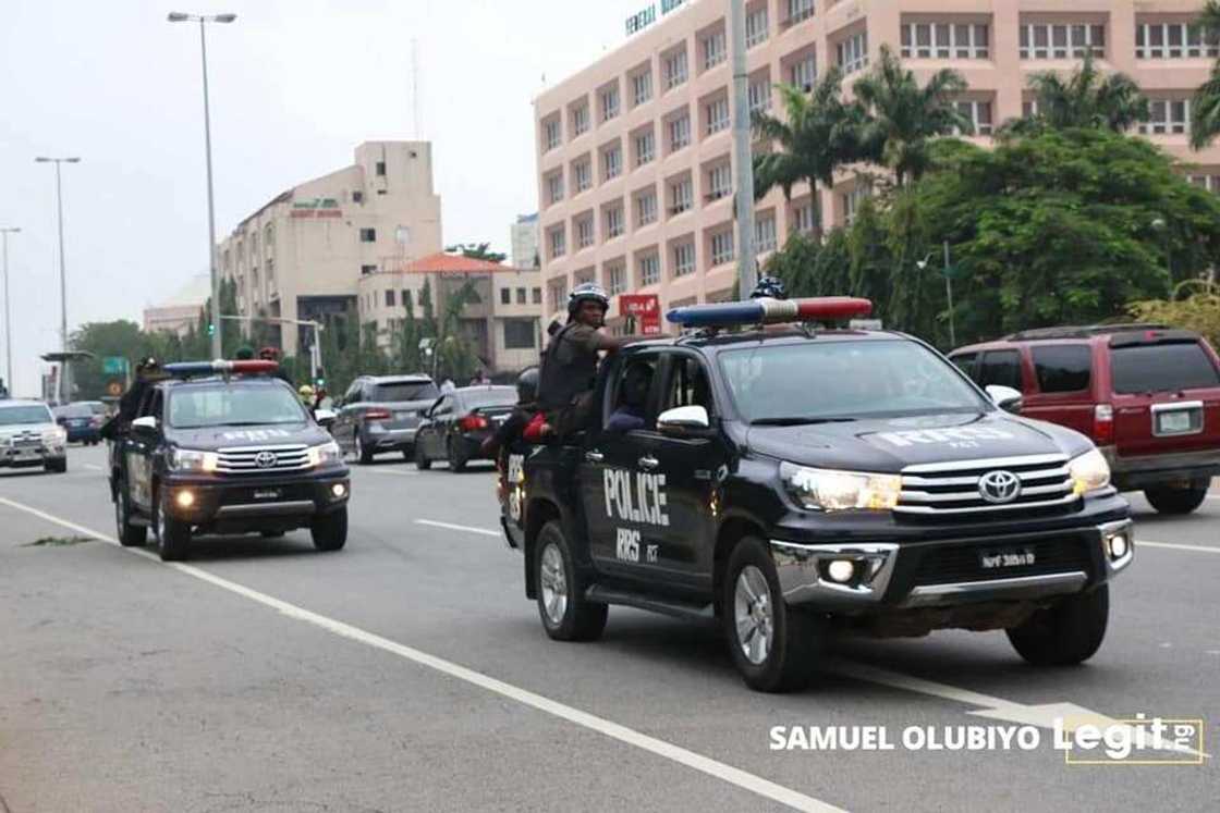 Security officials patrol vans around Federal High Court, Abuja Security officials patrol vans around Federal High Court, Abuja