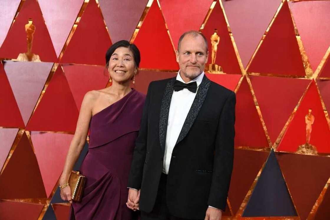 Woody Harrelson and his wife Laura Louie in Hollywood, California Woody Harrelson and his wife Laura Louie in Hollywood, California