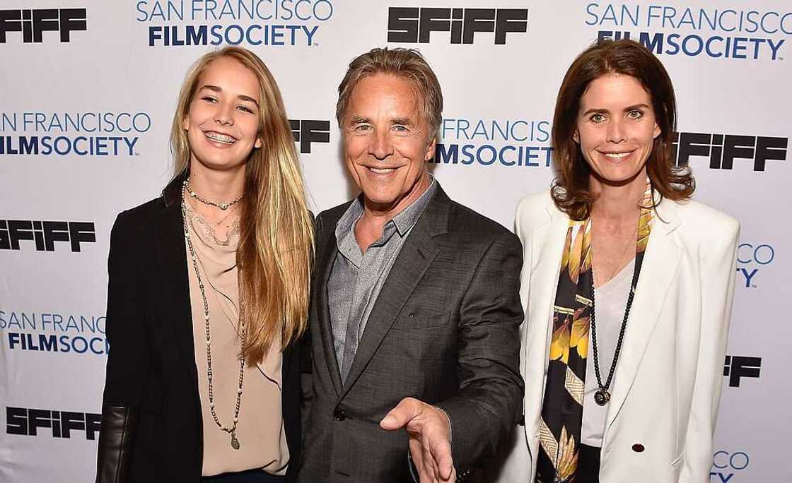 Atherton Grace Johnson (L), Don Johnson (C) and Kelley Phleger (R) pose for a photo