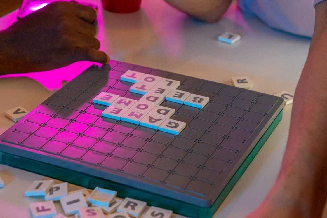 People playing a board game at a party