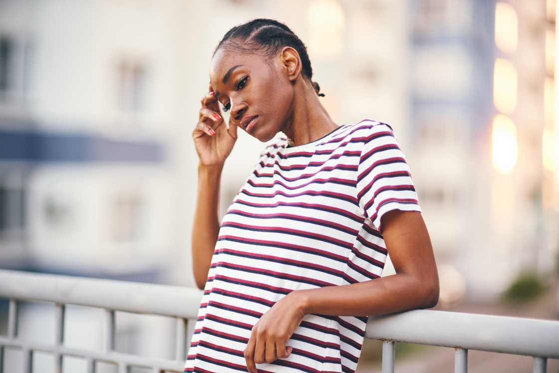 A stressed black woman A stressed black woman