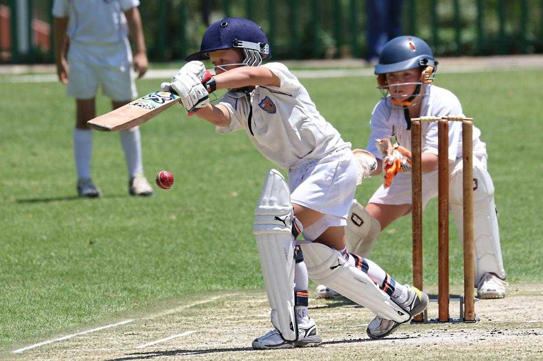 Two kids playing cricket. Two kids playing cricket.
