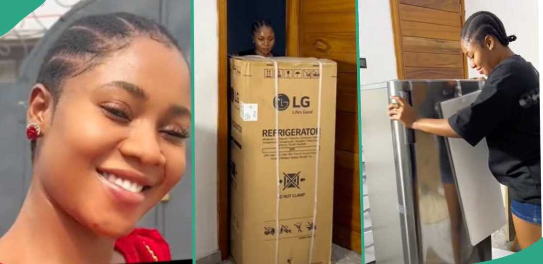 Lady shows off a fridge she bought. Lady shows off a fridge she bought.