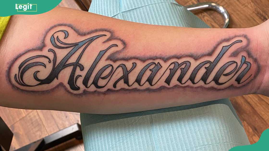 Cursive name tattoo