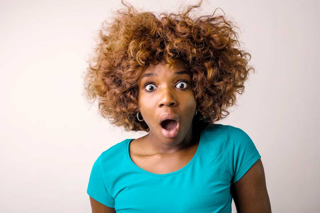 Woman showing a surprised expression. Woman showing a surprised expression.