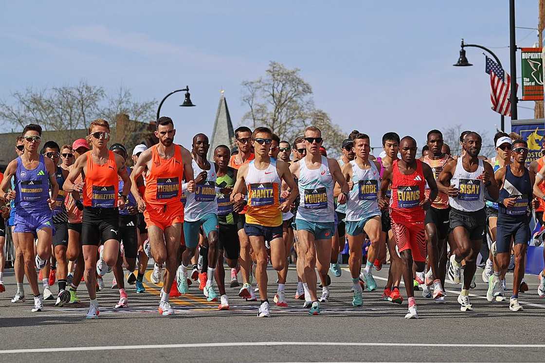 The Men's Elite runners take off at the start The Men's Elite runners take off at the start