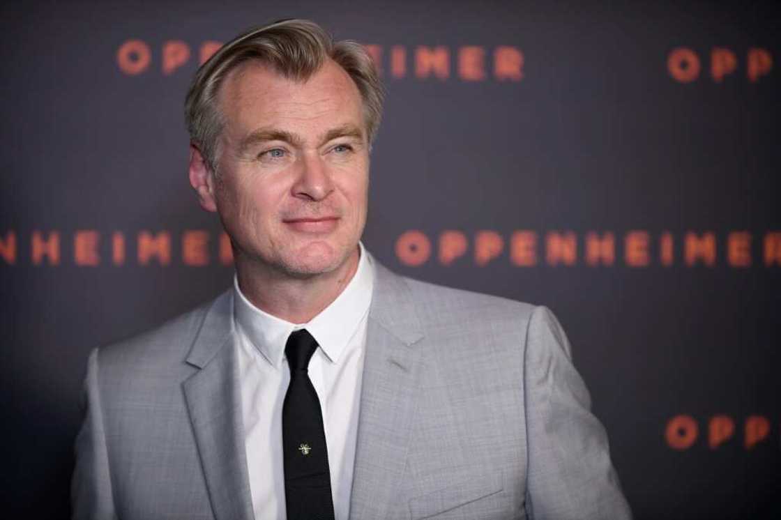 Christopher Nolan says the story of the invention of the atomic bomb told in his new film "Oppenheimer" is a warning to the world as we grapple with artificial intelligence