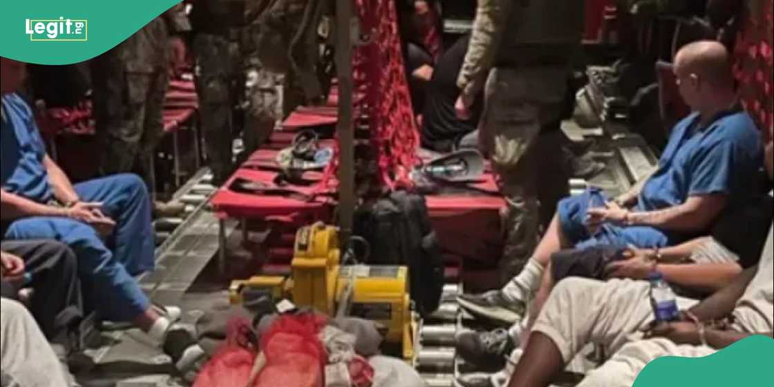 Deportees shackled on flight out of US. Deportees shackled on flight out of US.