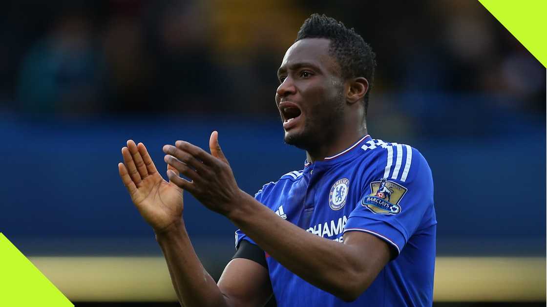 Mikel Obi reaches out to Enzo Fernandez as the Argentine begins Premier League career