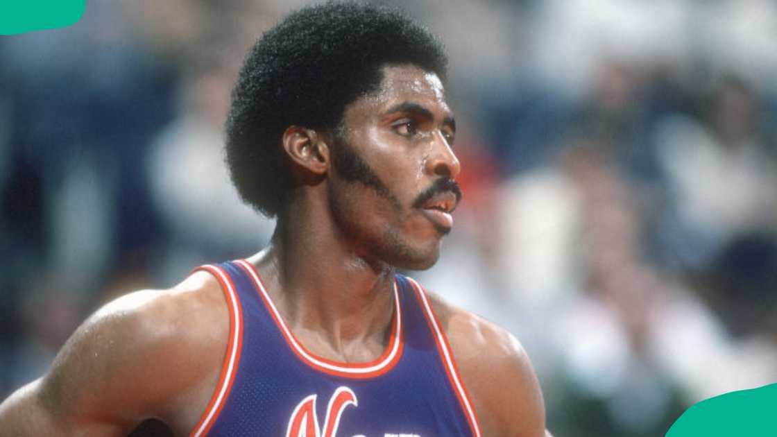 Buck Williams looks on against the Washington Bullets during an NBA basketball game circa 1982 Buck Williams looks on against the Washington Bullets during an NBA basketball game circa 1982