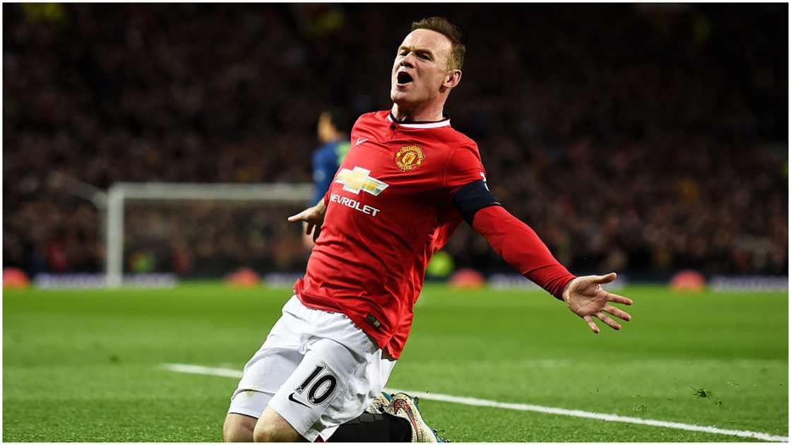 Wayne Rooney celebrates after scoring during the FA Cup Quarter Final match between Manchester United and Arsenal at Old Trafford. Photo by Laurence Griffiths. Wayne Rooney celebrates after scoring during the FA Cup Quarter Final match between Manchester United and Arsenal at Old Trafford. Photo by Laurence Griffiths.