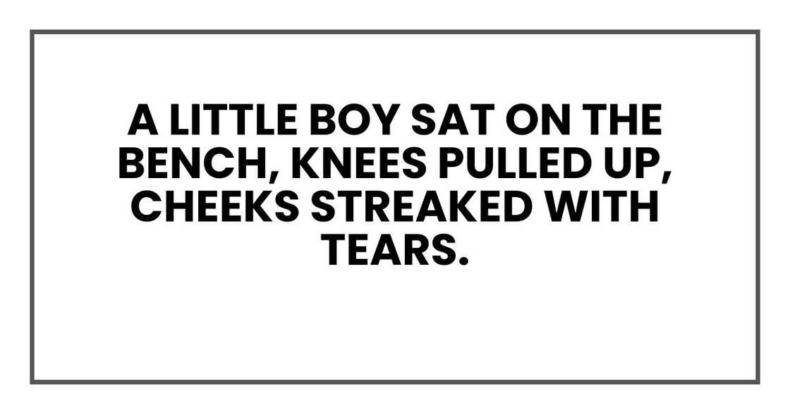 A little boy sat on the bench, knees pulled up A little boy sat on the bench, knees pulled up