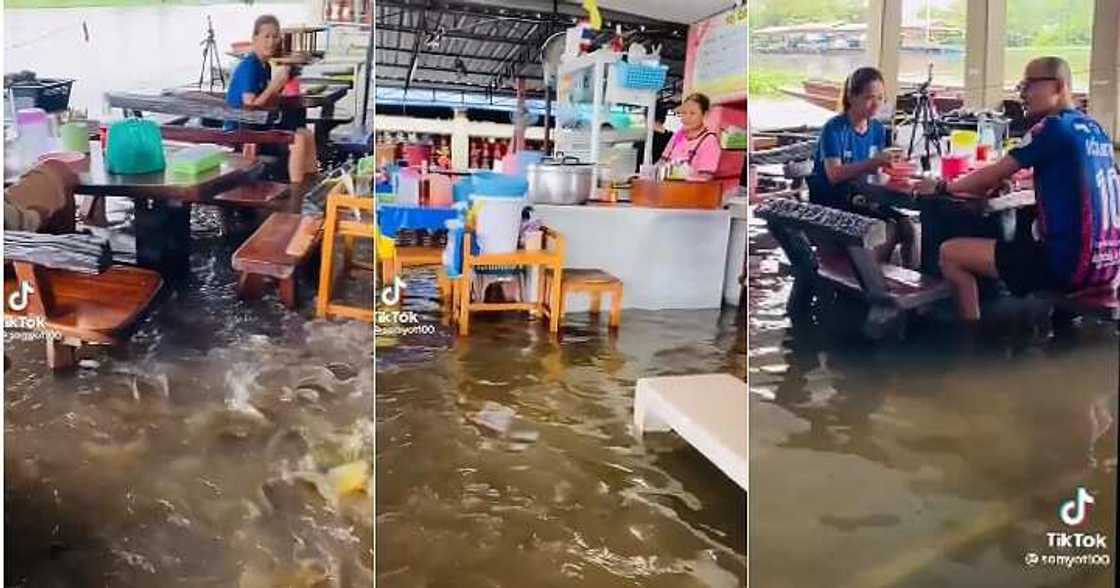 Customers eat in flooded restaurant, flood Customers eat in flooded restaurant, flood