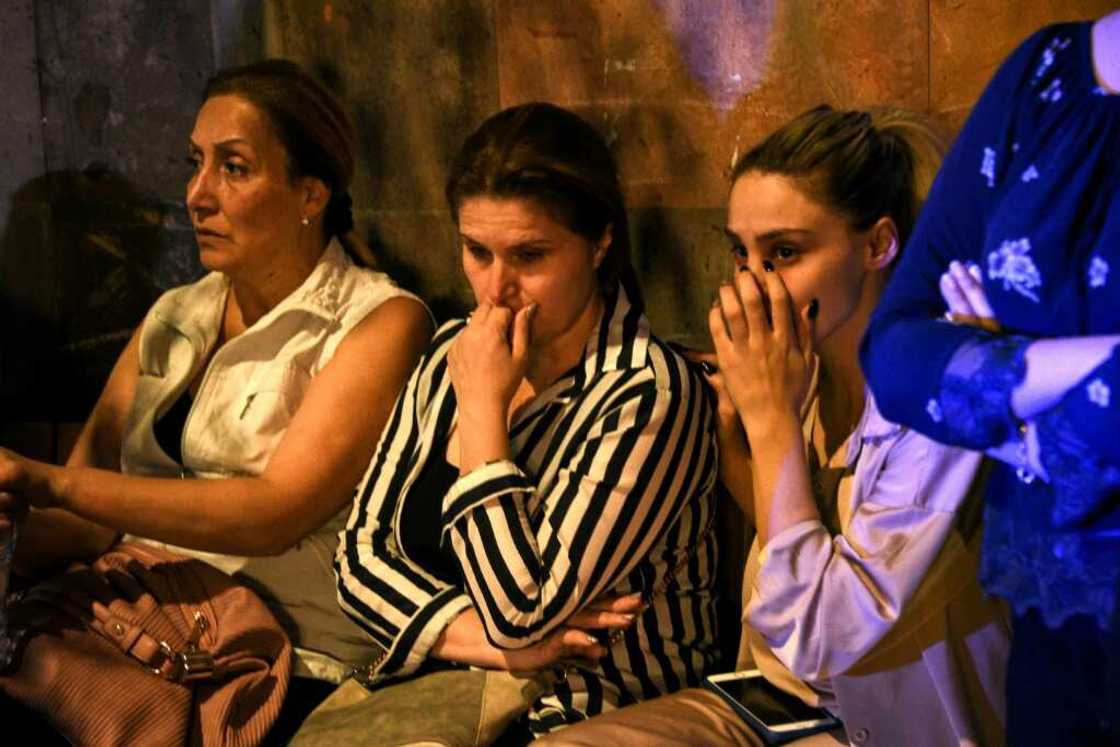 Relatives of servicemen who were wounded in border clashes between Armenia and Azerbaijan, gather anxiously outside a military hospital in Yerevan Relatives of servicemen who were wounded in border clashes between Armenia and Azerbaijan, gather anxiously outside a military hospital in Yerevan
