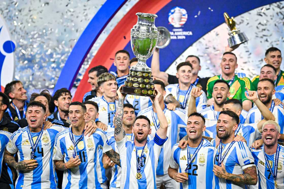 Lionel Messi lifts the Copa America trophy