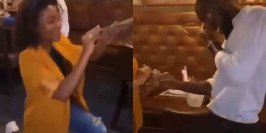 Lady goes down on her knees to propose marriage to her longtime boyfriend in public Lady goes down on her knees to propose marriage to her longtime boyfriend in public