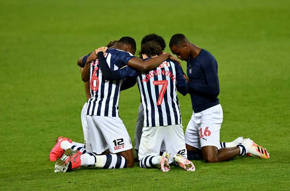 Semi Ajayi and WBA teammates pray to God after getting Premier League promotion