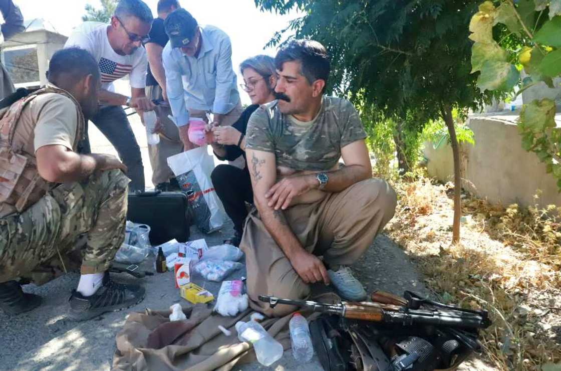 An injured member of the Iranian Kurdish nationalist group Komala receives treatment, after Iranian cross-border strikes in Iraq An injured member of the Iranian Kurdish nationalist group Komala receives treatment, after Iranian cross-border strikes in Iraq