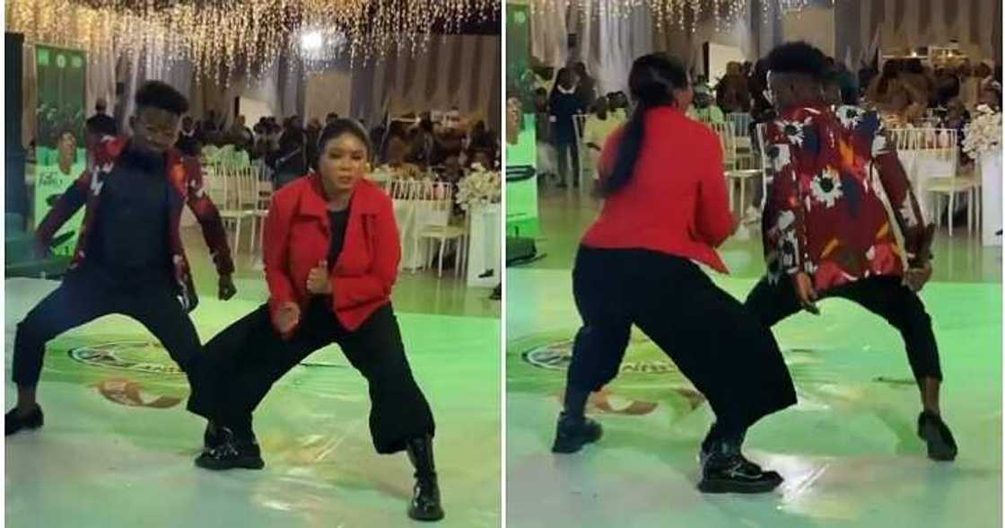 MC dances with pretty lady, wedding