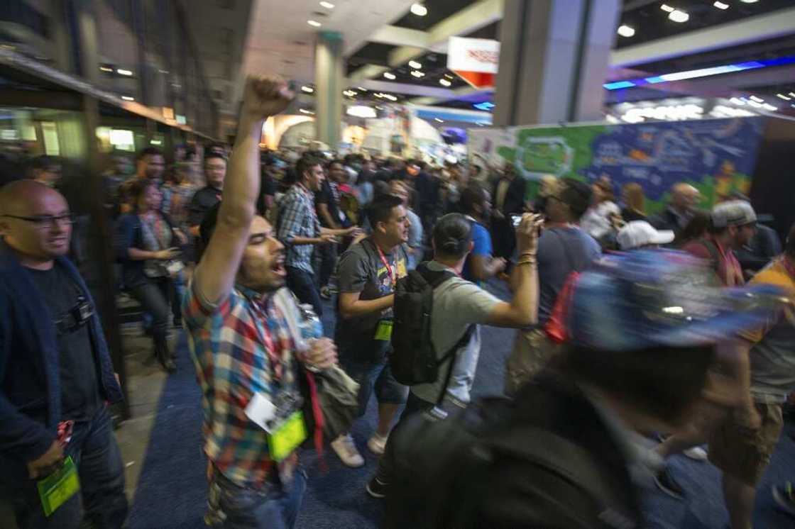 People rush into an exhibit hall on opening day of the Electronic Entertainment Expo (E3) at the Los Angeles Convention Center in June 2017 People rush into an exhibit hall on opening day of the Electronic Entertainment Expo (E3) at the Los Angeles Convention Center in June 2017