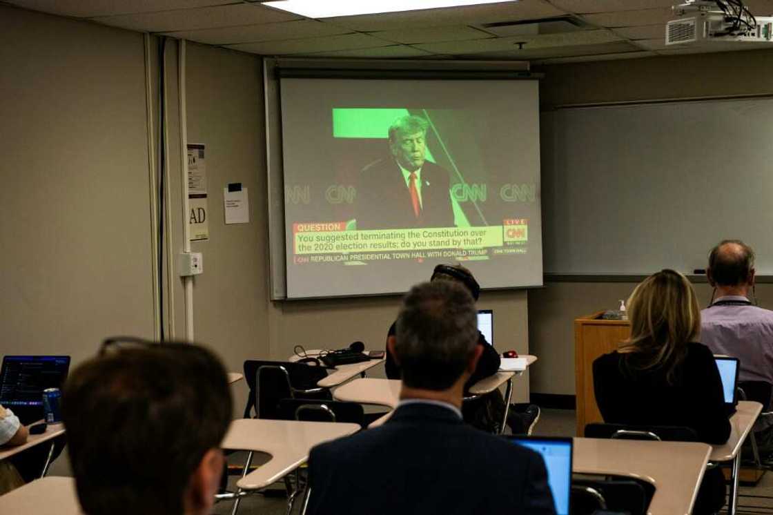 Reporters watch a CNN town hall with former US president and 2024 Republican hopeful Donald Trump at St. Anselm College in New Hampshire Reporters watch a CNN town hall with former US president and 2024 Republican hopeful Donald Trump at St. Anselm College in New Hampshire