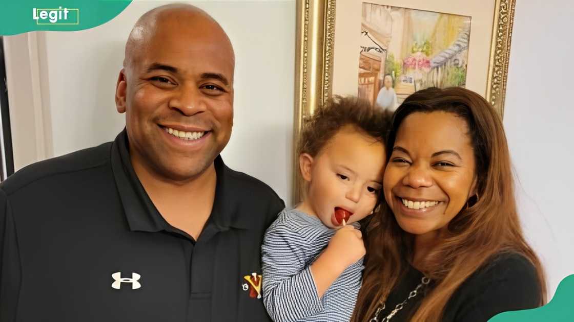 Kathy Ambush and Clarence Thomas smile in a family photo Kathy Ambush and Clarence Thomas smile in a family photo