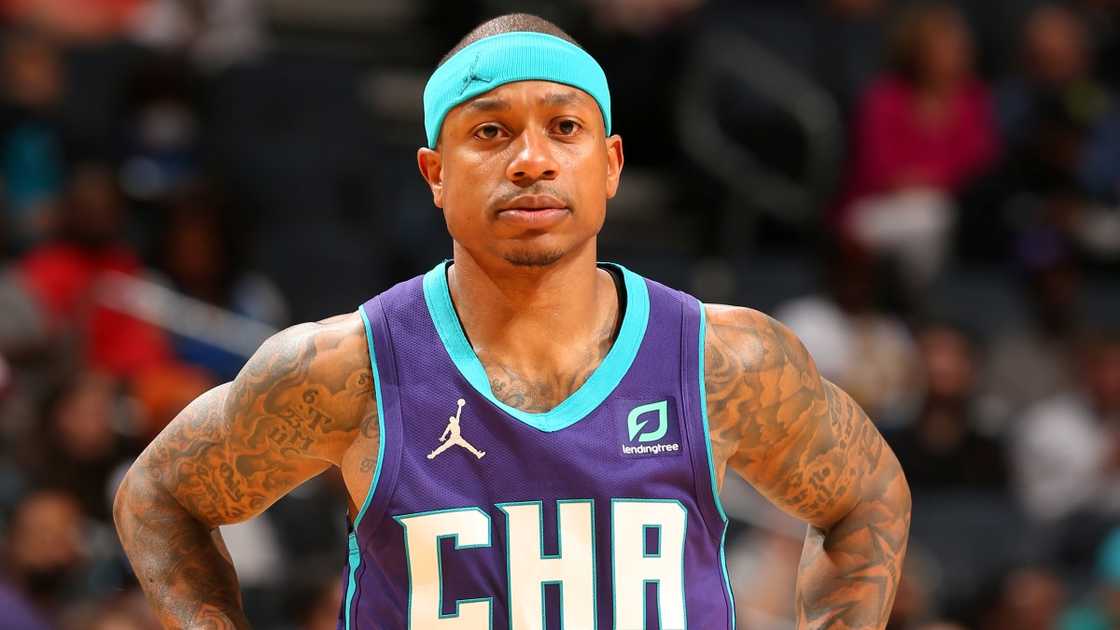 Isaiah Thomas of the Charlotte Hornets looks on during a game. Isaiah Thomas of the Charlotte Hornets looks on during a game.