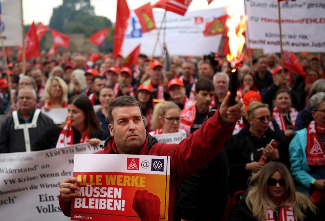 IG Metall metalworkers union members demonstrate in Hanover where talks between unions and Volkswagen management are to start IG Metall metalworkers union members demonstrate in Hanover where talks between unions and Volkswagen management are to start